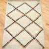Handmade Moroccan White carpet with a geometric pattern
