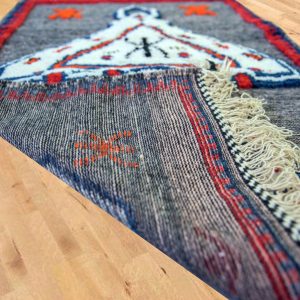 gray moroccan rug with Tazerzit Berber symbol
